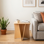Large Maple End Table holding books and a decorative bowl
