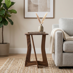 Small Walnut Accent Table holding a book and decorative vase